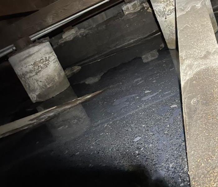 Crawl space flooded with 500 gallons of sewage.